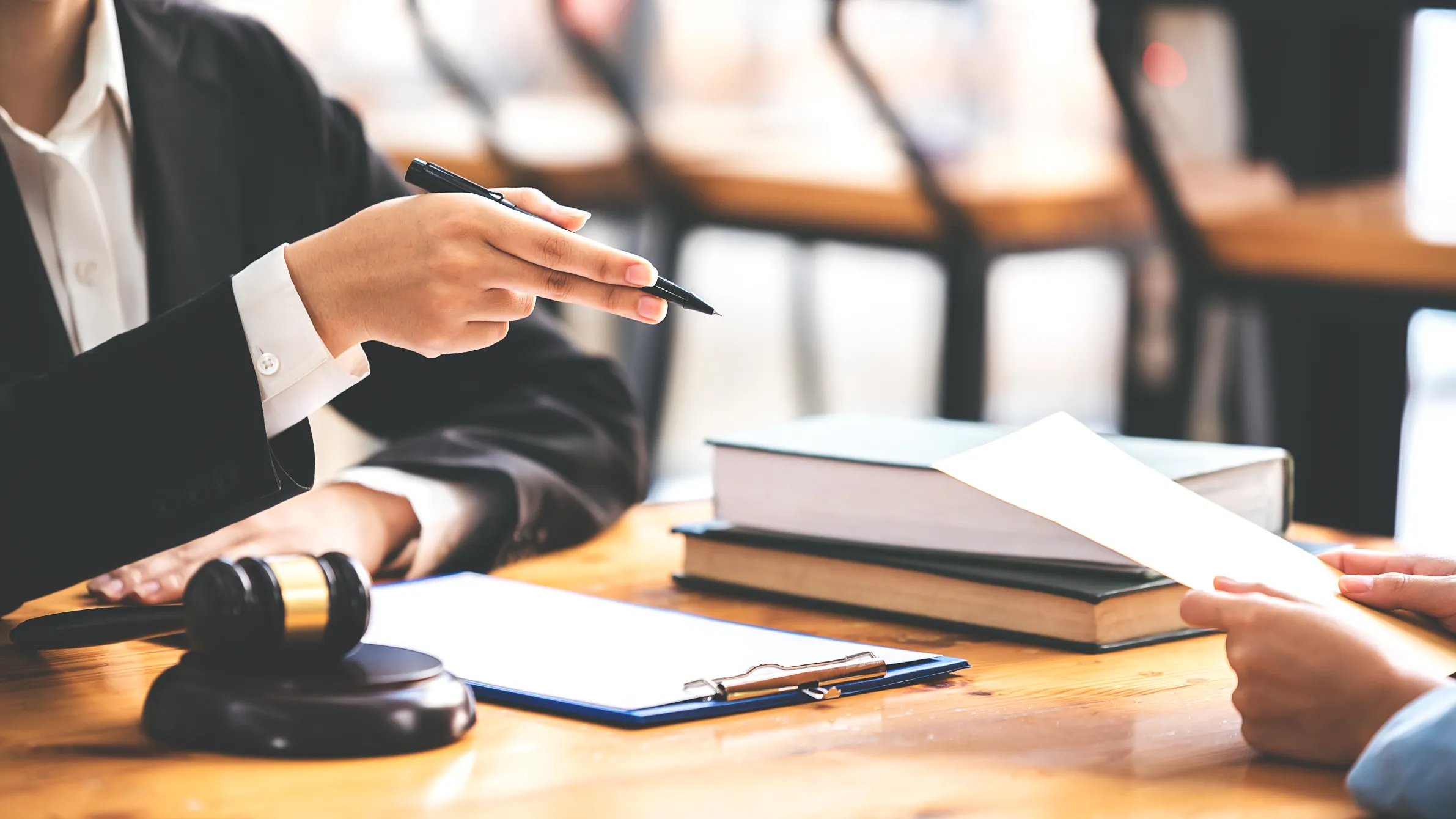 lawyers-discussing-a-document-in-a-bright-office-2026-01-08-06-23-17-utc